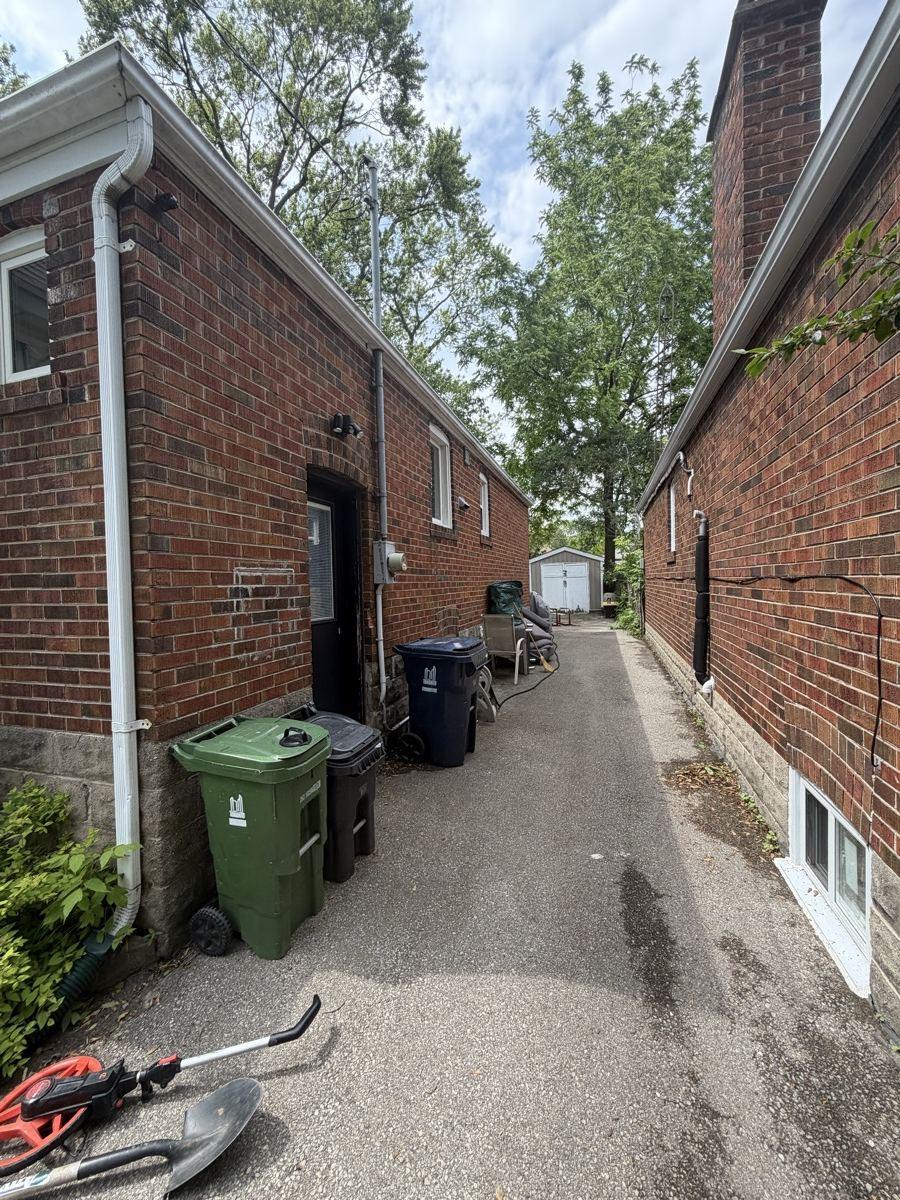 Before — Open Driveway → Custom Gate & Fence